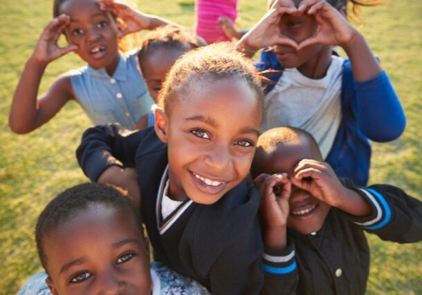 Elementary school kids having fun outdoors, high angle
