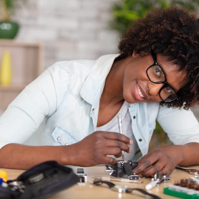 electronics repair tech fixes circuit board electronics repair tech fixes circuit board